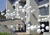 Balloons adore Langford Building in celebration of College of Architecture's 100th birday..
